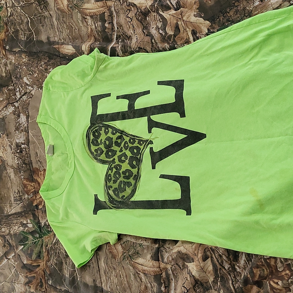 T-shirt from L.A tees color is a bright green and the size is medium